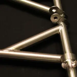 A close up of an 08-12 XP Summit Titanium Rear Suspension Front Swing Arm.
