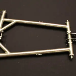 An image of a 11-23 Pro/Axys Titanium Rear Suspension Front Torque Arm on a black surface.