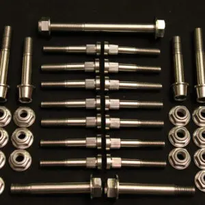A set of 2011-2024 Polaris Pro Titanium bolts and nuts on a black surface.