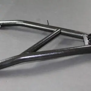 A black motorcycle frame on a gray surface.