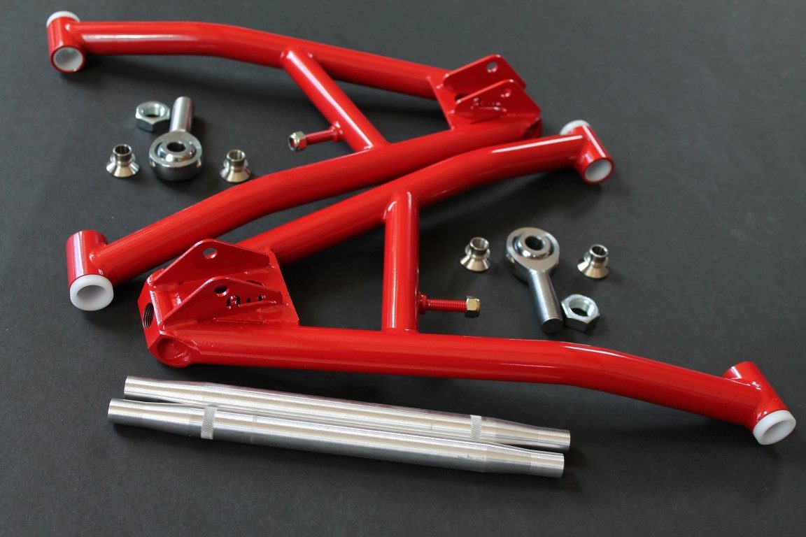 A set of red front and rear suspension parts.