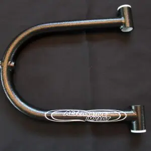 A black bicycle handlebar with a white letter on it.