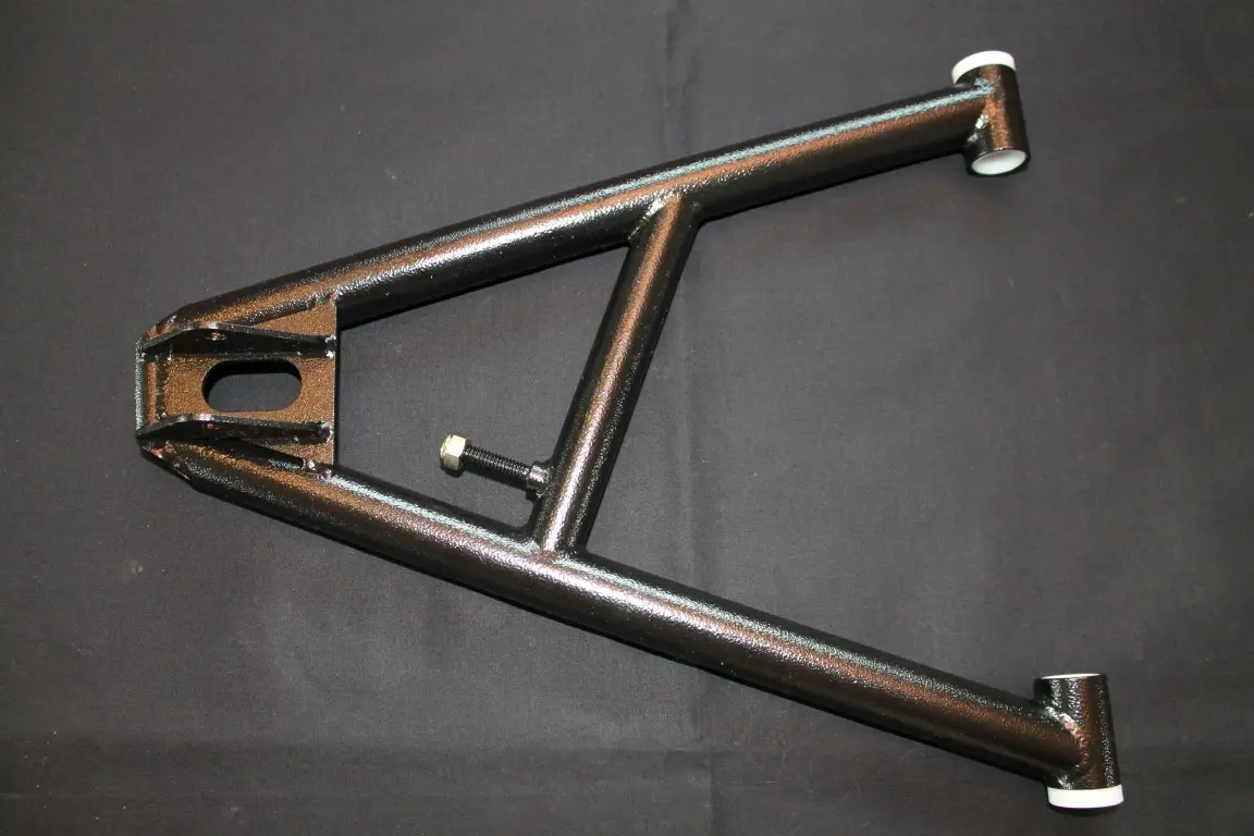 An image of a metal frame on a black surface.